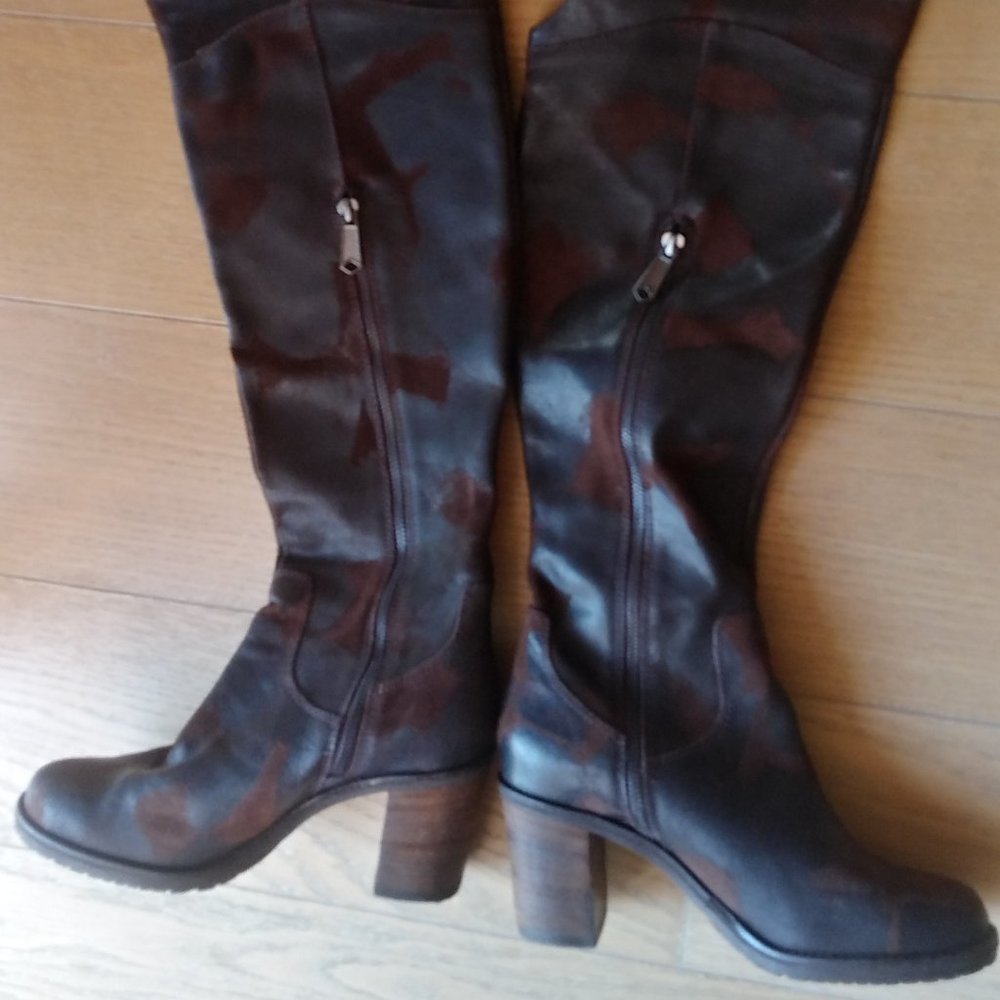 Winter Boot knee high with adjustable strap.